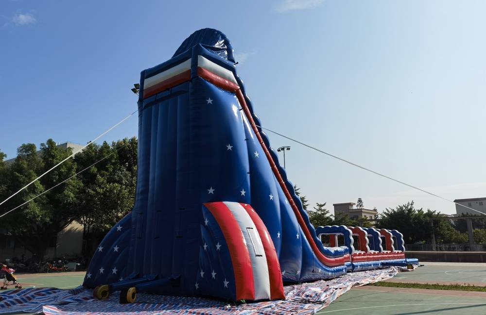 27ft Dual Lane Super Slide  Mr. Bounce Inflatable Rentals