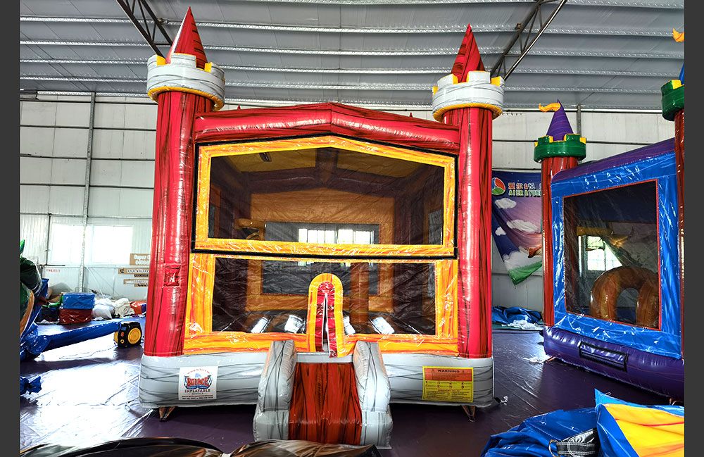 Image 1 of Themed Red Orange Bounce House