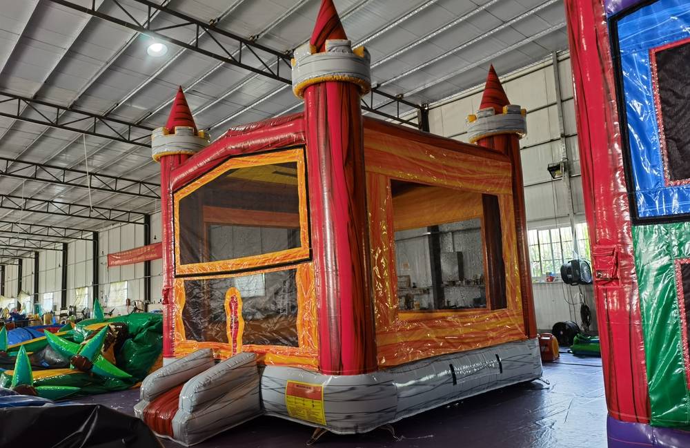 Image 9 of Themed Red Orange Bounce House